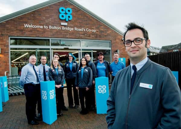 EXPANSION: Store Manager Daniel Beaumont with his staff at the opening of a newCo-Op store at Bolton Bridge Road, Ilkley. PIC: Mark Bickerdike Photography