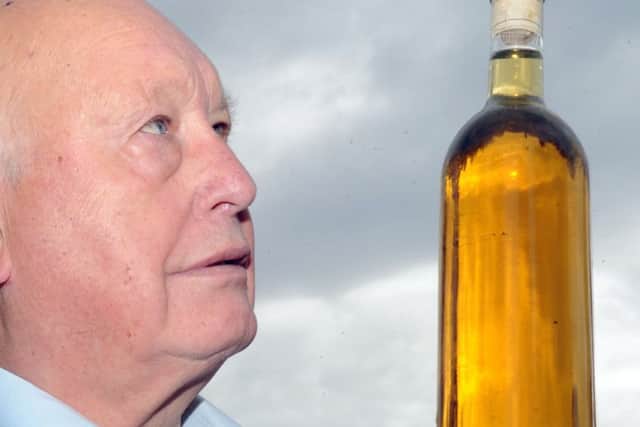 Michael Badger  of Roundhay by  his Bee House with a bottle of Honey Mead ...story Neil Hudson    24th oct 2016