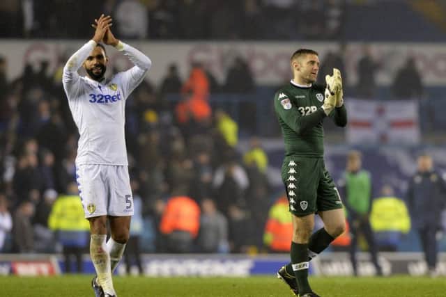 Kyle Bartley and Robert Green applaud the Leeds fans at full-time after Tuesday night's 2-0 win.  Picture: Bruce Rollinson