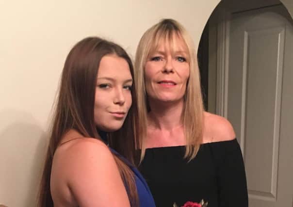 Missing teenager Amy Wilson, pictured left, with her mum.
