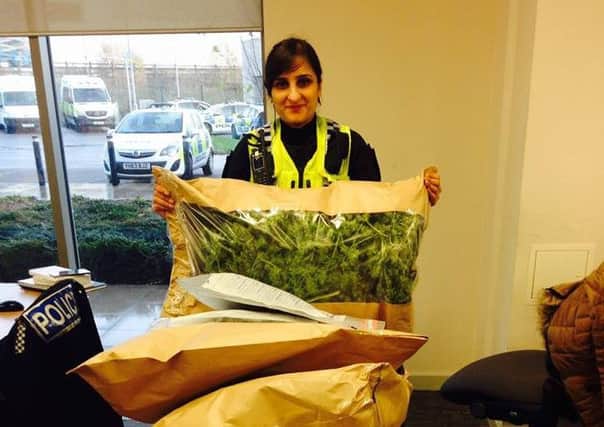 PC Amna Naseer with the cannabis discovered in the boot of a car.