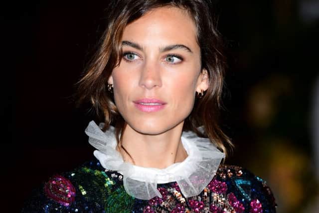 STYLE LOOKS OF THE YEAR Alexa Chung - The model, presenter and style icon has impressed the fashion world with her collection for Marks & Spencer, called Archive by Alexa. She visited the M&S Archive at the University of Leeds to create the retro-inspired pieces, many of which were named after streets in the city. She has the knack of being able to wear even quite challenging clothes with flair, as with this sequin mini tunic worn at Burberry's September show. She keeps her hair and make-up off-duty casual, creating an intriguing contrast with the opulence of the sequins. Picture: Ian West/PA Wire