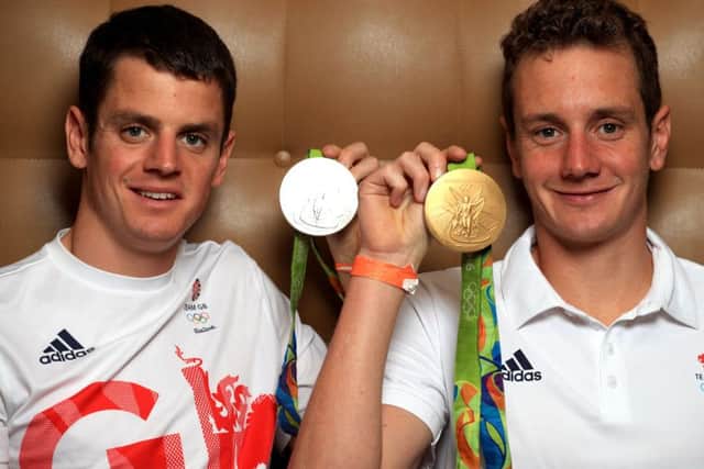 File photo dated 23-08-2016 of Great Britain's Alistair (right, gold) and Jonny Brownlee (silver) pose with their medals PRESS ASSOCIATION Photo. Issue date: Thursday December 15, 2016. Exhausted Jonny Brownlee was leading the Triathlon World Series in Mexico with 700m left to run, but the searing heat had taken its toll as he began to weave over the road See PA story SPORT Christmas Best and Worst. Photo credit should read John Walton/PA Wire.
