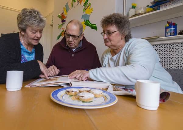 Brian and Pauline with Deborah Marshall, a Day Support Worker at Armley Grange, in Leeds.