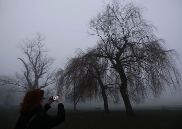 The heavy fog is expected to largely lift ahead of New Year's Eve fireworks displays. Credit: Yui Mok/PA Wire