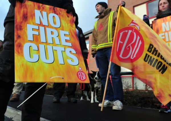 11 December 2015.......   objectors protesting to the proposed closure of Moortown fire station - at the official opening of Killingbeck fire station in Leeds. Picture Tony Johnson