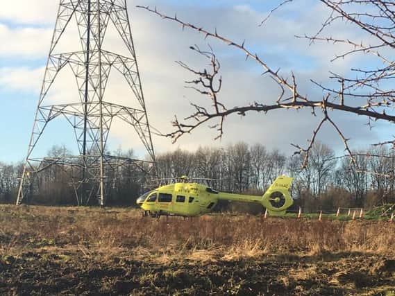 A Yorkshire Air Ambulance helicopter on fields near Lingwell Nook Lane this afternoon. Picture: @reavewestwell