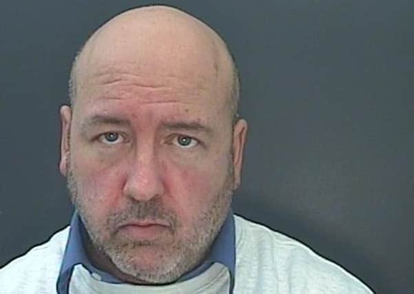 Mark Alan Griffiths is wanted on recall to prison.