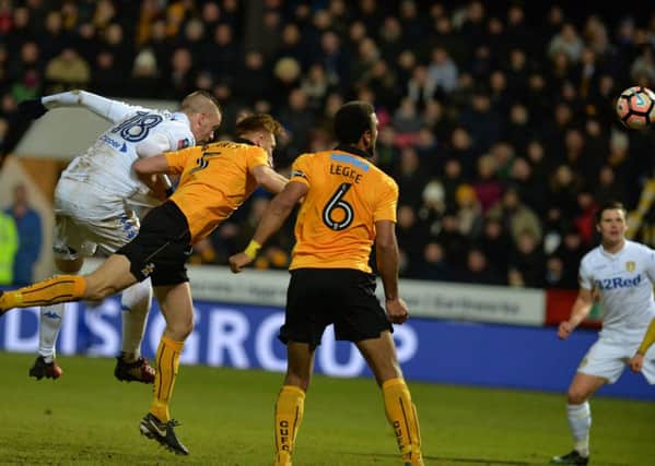 Pontus Jansson heads towards the Cambridge goal before Alex Mowatt deflects the ball in for Leeds's winner  Picture: Bruce Rollinson
