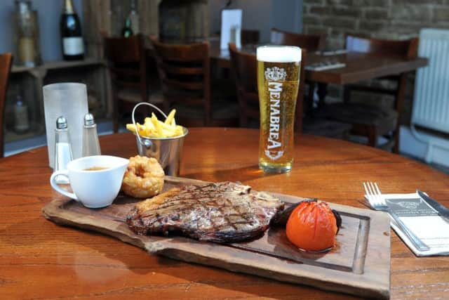 5 January 2017 .......  Oliver
The Moody Cow, Apperley Bridge.
 20oz T-Bone steak - served with a grilled tomato and a flat mushroom chips and onion rings.  Picture Tony Johnson