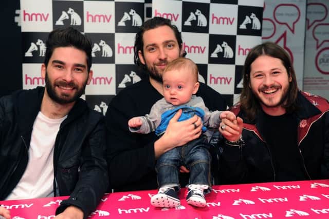 Seven month old Olly Seabourne meets You Me At Six at HMV in Leeds. PIC: Jonathan Gawthorpe