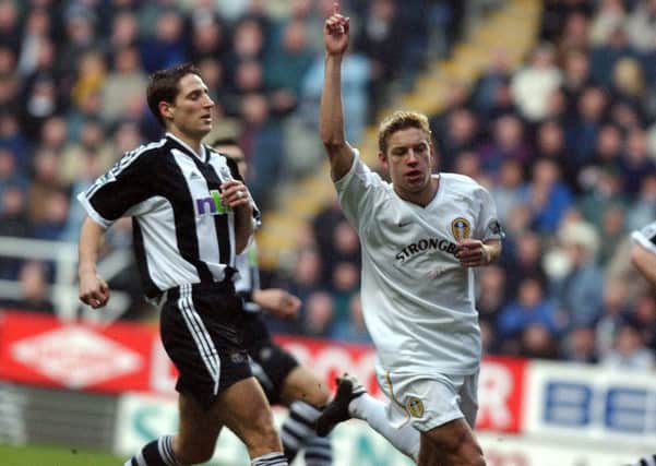 Alan Smith of Leeds United celebrates his opening goal against Newcastle, during their FA Barclaycard Premiership match at Newcastle's St James' Park on Saturday January 12 2002.