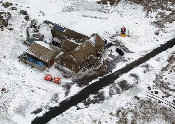 Snow surrounding the Tan Hill Inn in North Yorkshire. PIC: PA