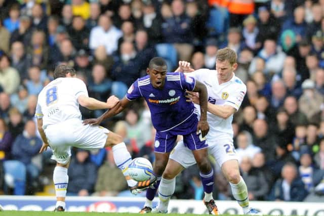 Leeds United's  Michael Brown challenges Theo Robinson when the two sides met at Elland Road back in April 2012. Picture: Simon Hulme
