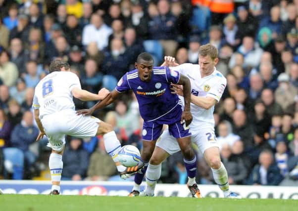 Leeds United's  Michael Brown challenges Theo Robinson when the two sides met at Elland Road back in April 2012. Picture: Simon Hulme