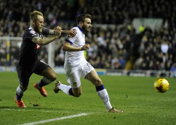 Johnny Russell and Stuart Dallas battle for the ball during last season's 2-2 draw at Elland Road. Picture Bruce Rollinson