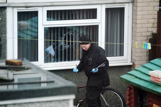 Police have begun an investigation after a gunshot was fired in Hebden Chase, Whinmoor, Leeds, causing damage to a house. 
11th January 2017.
Picture : Jonathan Gawthorpe