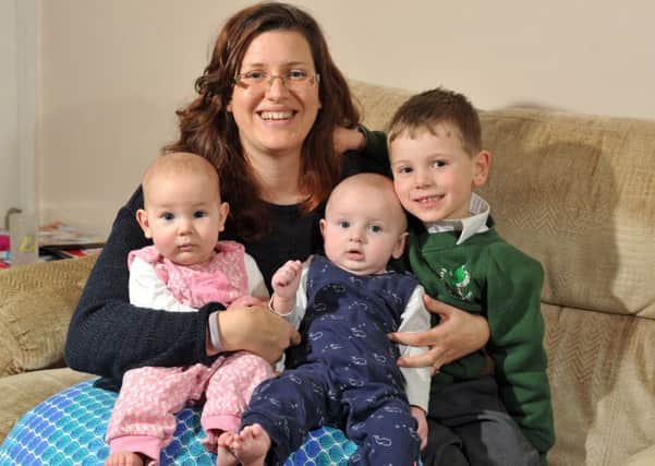 ALL TOGETHER NOW: Dianne Green from Farsley, Leeds, who underwent IVF treatment, with her son William and twins Sophie and Charlie.