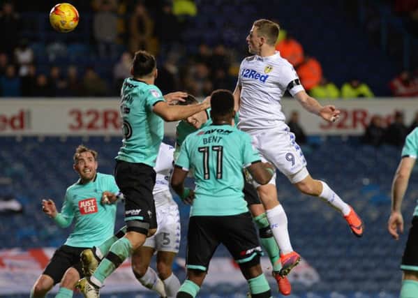 Chris Wood heads in what proved to be Leeds' winning goal at Elland Road on Friday night. Picture: Bruce Rollinson