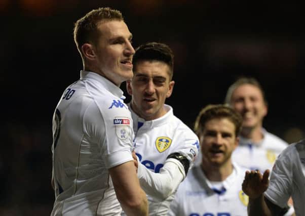 Chris Wood celebrates with Pablo Hernandez after scoring Leeds United's winning goal against Derby.