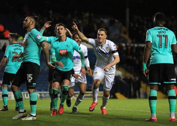 Leeds United's Chris Wood celebrates scoring his side's winning goal against Derby County on Friday night. Picture: Mike Egerton/PA