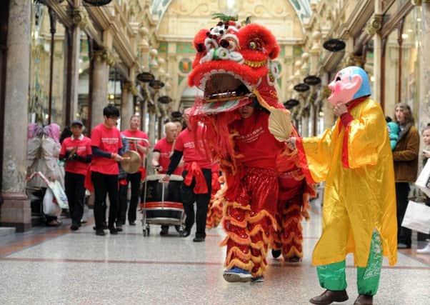 Date:7th February 2016. Picture James Hardisty.
Leeds Chinese Community Association Lion Dance Troupe, welcoming the Chinese New Year 2016 of the Monkey, during ceremony inside the Victoria Quarter, Leeds.