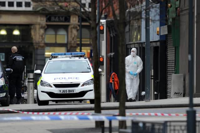Am army bomb disposal robot works at the scene
