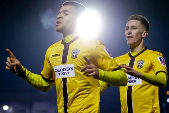 Sutton United's Maxime Biamou celebrates scoring against AFC Wimbledon (Photo: PA)
