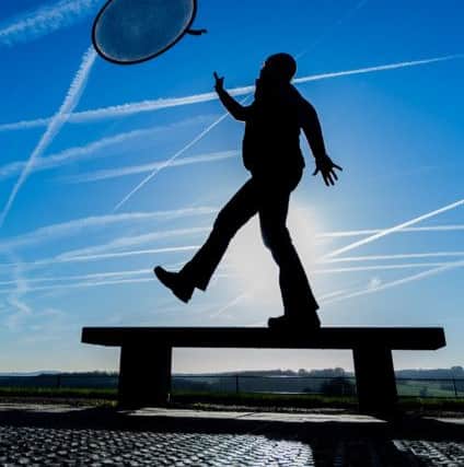 Date:5th January 2016. Picture James Hardisty. Pictured A member of the pubic plays Noughts and Crosses in the sky under a winter sun at the Yorkshire Sculpture Park, Bretton, Wakefield.