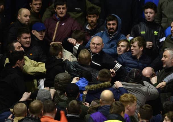 Scenes in the terraces during the Barnsley v Leeds United match at Oakwell. Picture: Bruce Rollinson