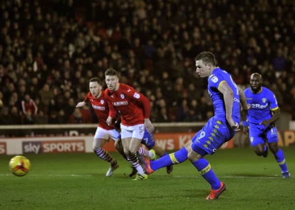 Chris Wood strikes Leeds' second goal from the penalty spot against Barnsley to take his tally for the season to 20.