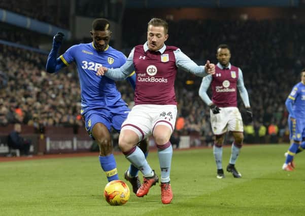 Hadi Sacko is held off the ball by Ross McCormack during last month's clash between Aston Villa and leeds at Villa Park.  Picture: Bruce Rollinson