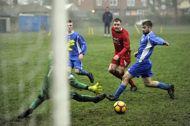 Damon Jenkinson scores for  Leeds Independent at home to Farsley Celtic Juniors. PIC: Steve Riding
