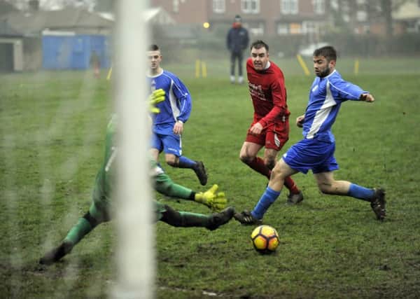 Damon Jenkinson scores for  Leeds Independent at home to Farsley Celtic Juniors. PIC: Steve Riding