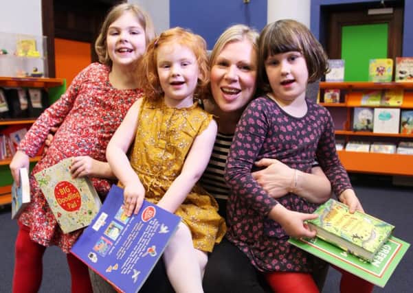 Kim Wood with daughters (l-r) Sophie, Phoebe and Chloe.