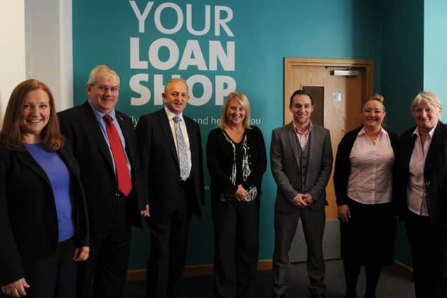 Chief Exec Chris Smyth and Leeds City Council Leader Counc Keith Wakefield at the new Credit Union shop 'Your Loan Shop' in Roundhay Road, Leeds. 14 November 2014. Picture Bruce Rollinson