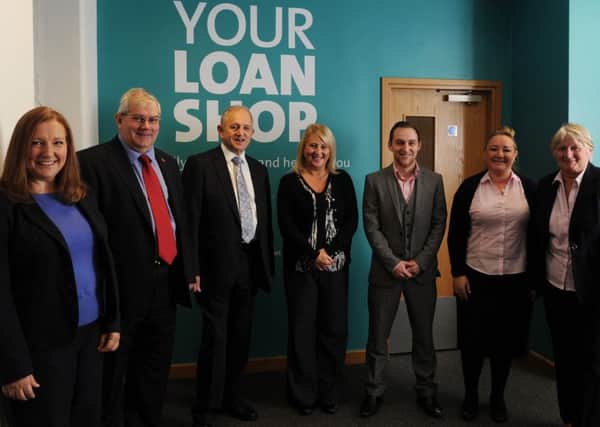 Chief Exec Chris Smyth and Leeds City Council Leader Counc Keith Wakefield at the new Credit Union shop 'Your Loan Shop' in Roundhay Road, Leeds.  14 November 2014.  Picture Bruce Rollinson