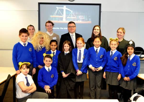 26 January 2017 .......    Solicitor General Robert Buckland QC MP teaching children from Adel Primary School about the law and their basic civil and criminal rights.
The Streetlaw school session was held at BPP Universitys law school  where pupils participated in a mock court trial of Goldilocks vs the Three Bears. Picture Tony Johnson