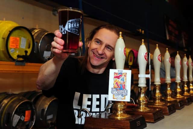 12 March 2014.   Leeds Beer Festival organiser David Dixon with a pint of Festival special beer  at Pudsey Civic Hall. (TJ1002/76c) Picture by Tony Johnson