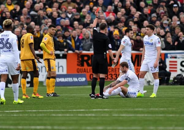 Leeds United's captain Liam Cooper is shown the red card. PIC: Jonathan Gawthorpe