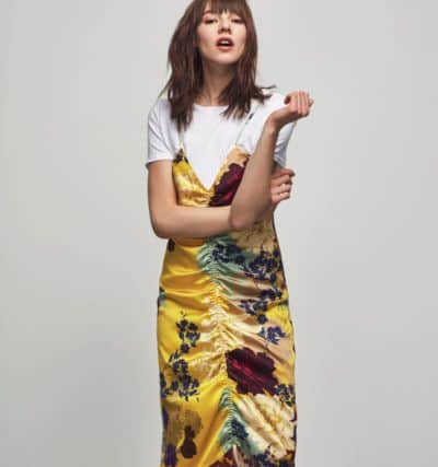 T-shirt, £9.99; yellow ruched floral print dress, £19.99; shoes, £39.99 . All at New Look.