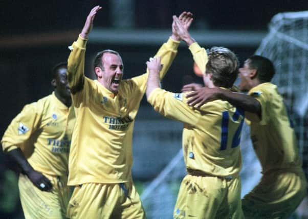 Gary McAllister is congratulated by, from left, Tony Yeboah, Tomas Brolin and Carlton Palmer after his first goal at Port Vale in 1995.
