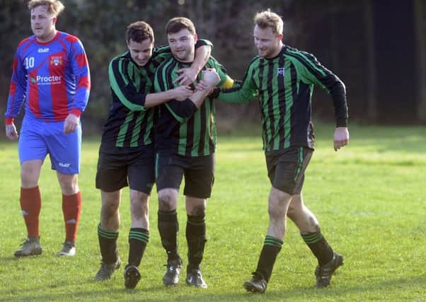 Horsforth Fairweather captain Tom Wilson is congratulated after scoring the second goal against Swillington Welfare. PIC: Simon Hulme