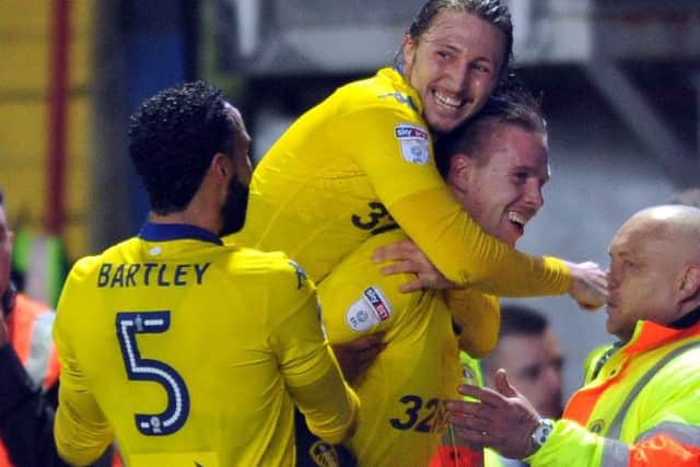 Pontus Jansson celebrates his late winner at Ewood Park with Luke Ayling and Kyle Bartley. PIC: Tony Johnson