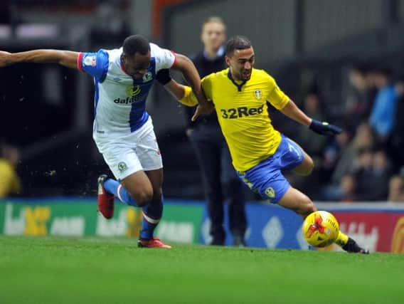 Kemar Roofe dribbles down the left flank at Ewood Park