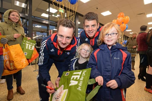 Alistair and Jonny Brownlee opened the new Aldi store in Guiseley, after hundreds queued outside. Picture: Bruce Rollinson
