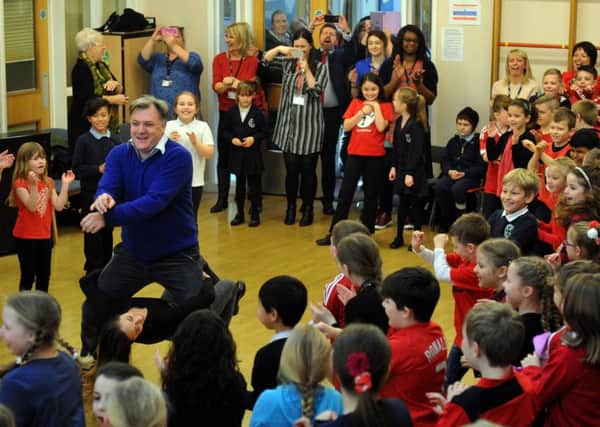 030217  Ed Balls with his Strictly Come Dancing Partner Katya Jones performing the Gangnam style dance with pupils at Normanton Common Junior School in Normanton.