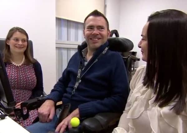 Jason Liversidge smiles as he hears his voice for the first time, as the 41-year-old father who has motor neurone disease will be able to keep his Yorkshire accent despite the fact he is losing the ability to speak. PIC: PA