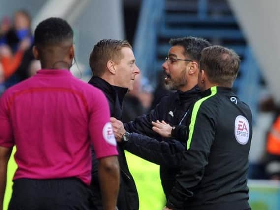 Garry Monk and David Wagner clash on the touchline.