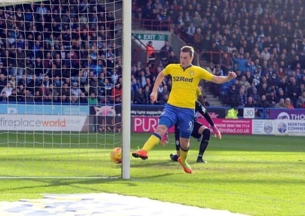 Chris Wood scores his first-half equaliser for Leeds at Huddersfield. PIC: Tony Johnson